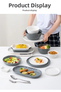 Close-up of modern ceramic tableware with textured surface and minimalist gray glaze