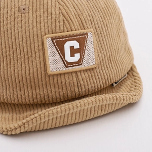 Infant winter corduroy soft brim cap in khaki with embroidered white letter C detail