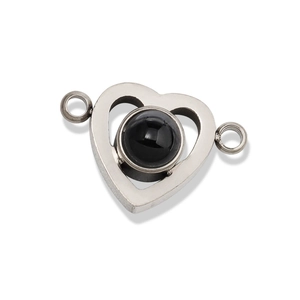 Detailed view of a heart-shaped stainless steel pendant with black projection stone stone