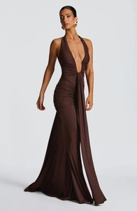 Detail of ruched waist and flowing ribbon on chocolate brown halter neck maxi dress