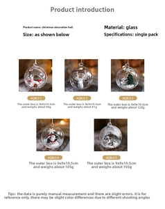 Detail of transparent glass Christmas ornaments with Santa Claus and reindeer designs