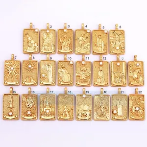 Set of 22 gold-plated tarot card pendants featuring detailed engravings and cubic zirconia
