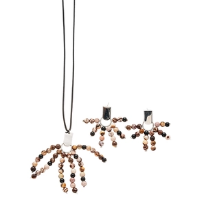 Vintage stone bead necklace and earring set with silver accents on a white backdrop