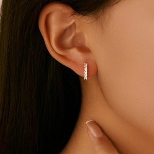 Classic S925 sterling silver huggie earrings with a row of sparkling moissanite stones