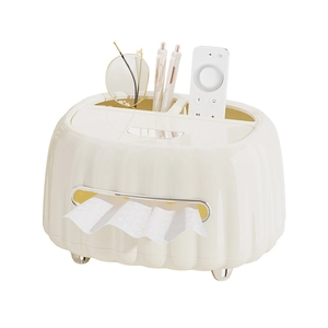 Cream-colored vertical ripple tissue box with three storage compartments and golden feet