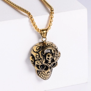 Vintage gold skull pendant with scrollwork relief and punk box chain for men
