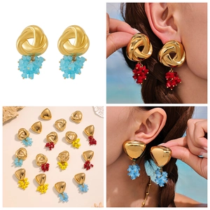 Detail of colorful tassel bead drop earrings with triangle and knot geometric metal studs