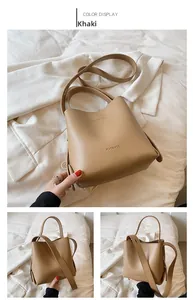 Detailed views of khaki bucket bag showing the spacious interior and sleek side profile