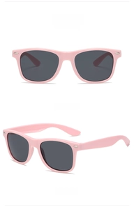 Pink square sunglasses with grey lenses and silver metal rivets detail view