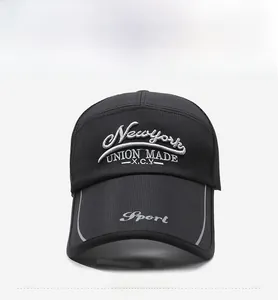 Detail of breathable black mesh baseball cap with white New York embroidery and sport logo