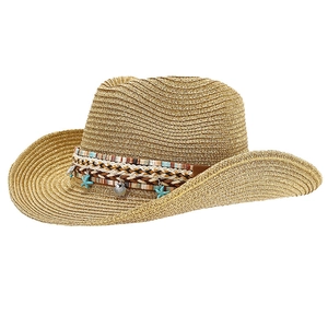 Bohemian straw panama hat with shell and starfish charms for summer sun protection