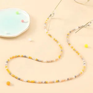 Macro shot of colorful faceted crystal bead eyewear chain with silicone grips