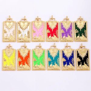 Detailed view of tarot pendants in multi-colored enamel with zircon accents
