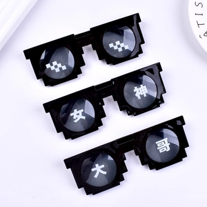 Detail view of black pixelated sunglasses featuring Goddess and Big Brother characters