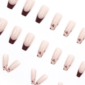 Long ballerina press-on nails with leopard print and nude pink French tip designs