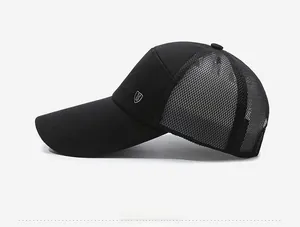 Side view of black mesh baseball cap with long brim and metal shield logo detail