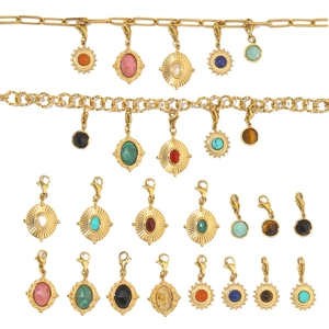 Detailed display of colorful gemstone sun pendants in gold stainless steel with lobster clasps