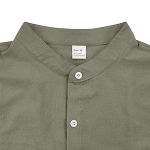 Front view of green linen Henley shirt for men with stand collar and button detail