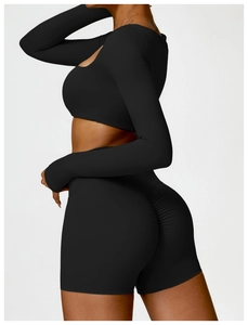 Rear view of black long sleeve yoga set with scrunch butt lifting sports shorts