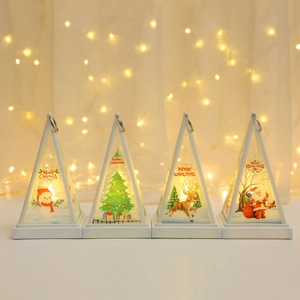 Detailed row of four Christmas LED lanterns featuring snowman and Santa Claus designs