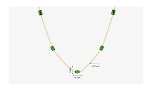 Detail of 18K gold plated necklace with five rectangular emerald green zircon stones