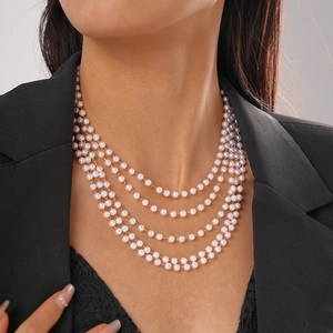 Luxurious multi-layer faux pearl necklace with gold chains for an elegant style