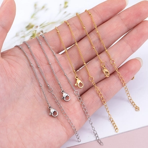 Polished stainless steel bead chains in gold and silver finish with lobster clasp