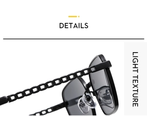 Detail view of stylish square sunglasses featuring unique gold metal chain link temples