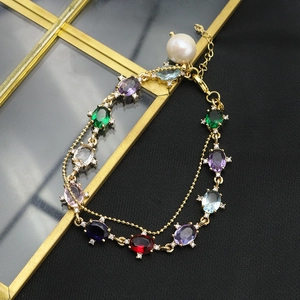 Elegant gold double-chain bracelet with multi-color zircons and large natural pearl