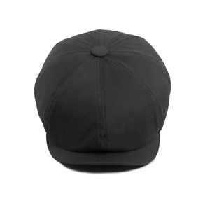 Classic black newsboy cap in octagonal design made of cotton with retro minimalist style