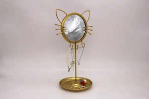 Golden cat-shaped jewelry organizer with round mirror, hanging hooks and base tray