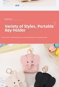 Detailed view of elephant coin purses in pink, beige, and black with pebbled leather texture