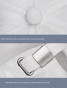 Detail of adjustable metal buckle and strap on white cotton baseball cap with neat stitching