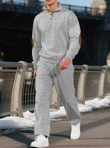 Men's grey vertical stripe knit set featuring half-zip pullover with elbow patches