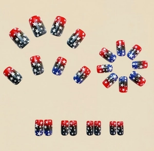 Detail of long square press-on nails with US flag theme, stars and blue red gradient