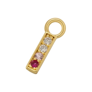Macro detail of a gold rectangular pendant with inlaid clear, pink, and red zircons