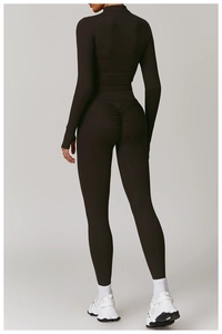 Detailed back view of high-waist scrunch butt yoga leggings and long sleeve sports top