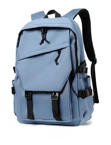 Detail view of water-resistant blue nylon backpack with adjustable side straps and mesh padding