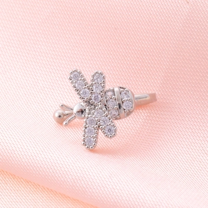 Macro detail of silver bee nose clip with micro-set white cubic zirconia stones