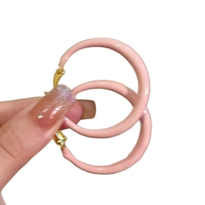 Pink enamel round hoop earrings with gold-plated metal finish for a summer sweet look