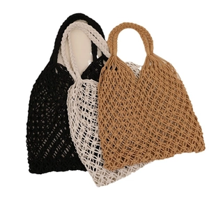 Handmade woven cotton rope beach bag in black, cream and brown with hollow mesh design