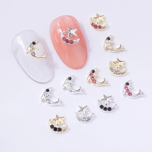 Exquisite star and moon nail art charms with pink rhinestones on gold and silver bases
