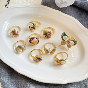 French vintage style gold pearl and enamel ring set with floral and butterfly designs