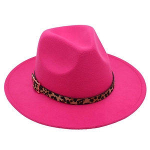 Detail of rose red fedora hat with leopard print band and golden metal buckle