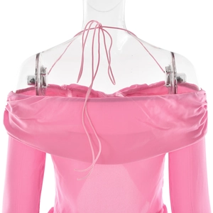 Detail view of pink off-the-shoulder chiffon top with halter neck tie and ruched texture