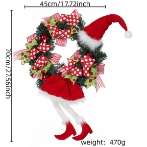Christmas wreath with long legs and berries measures 70cm high and 45cm wide