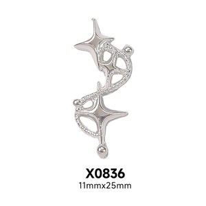 Detail of silver S-shape punk nail charm with star and bow, model X0836, 11x25mm