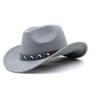 Grey western cowboy wool felt hat with turquoise ethnic beaded leather band on white background