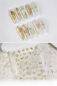 5D embossed nail stickers featuring green flowers, butterflies, and golden fans