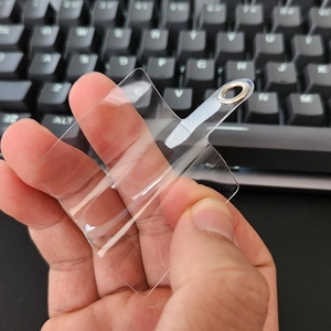 Transparent PVC phone tether tab with durable metal O-ring for crossbody lanyards